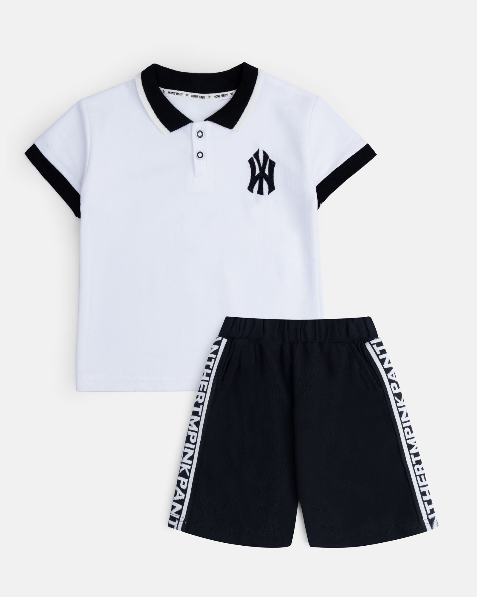 Classic White Polo & Black Shorts